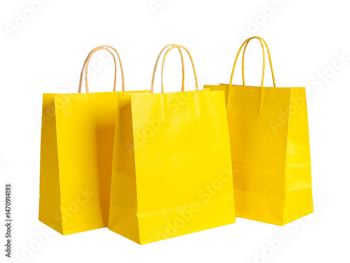 3 yellow shopping bags isolated on a transparent background 