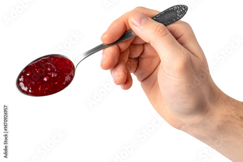 Hand holding a spoon with jam, isolated on a transparent background