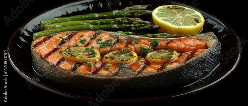 Grilled salmon with asparagus and lemon photo