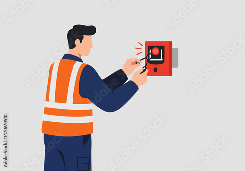 Technician Inspecting Fire Alarm System for Safety and Compliance