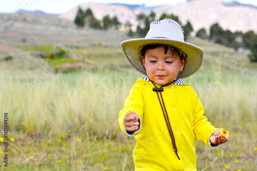 Latin toddler with damaged skin on the face.