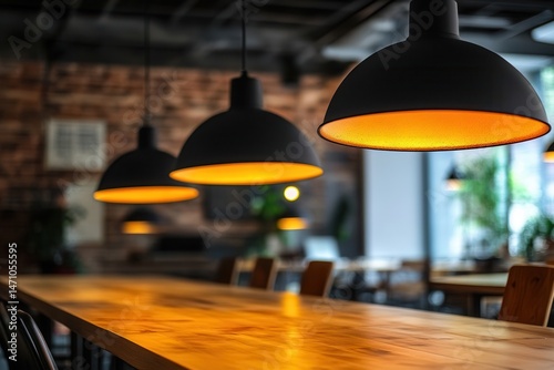 Modern cafe interior with warm pendant lighting, wooden tables, and a cozy atmosphere