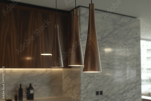 Modern kitchen interior featuring stylish wooden pendant lights above a marble countertop