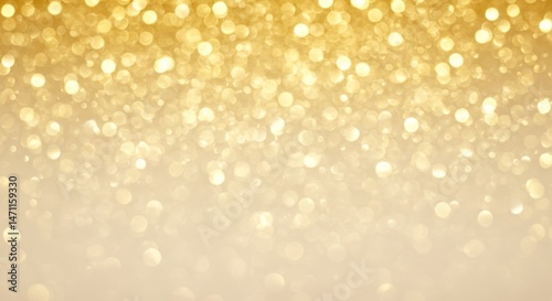 Elegant golden bokeh with a soft glow on a light neutral surface