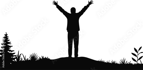 Silhouette of a person with raised arms standing in nature celebrating freedom and joy