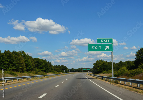 Exit Ahead to New Opportunities: Business Diversification or Life Transition Concept with Highway Exit Sign Pointing to a Promising Alternative Path