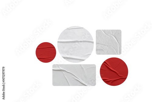 Colorful torn paper sticker shapes on black background, including red, green, blue, yellow and white elements with wrinkled texture.
