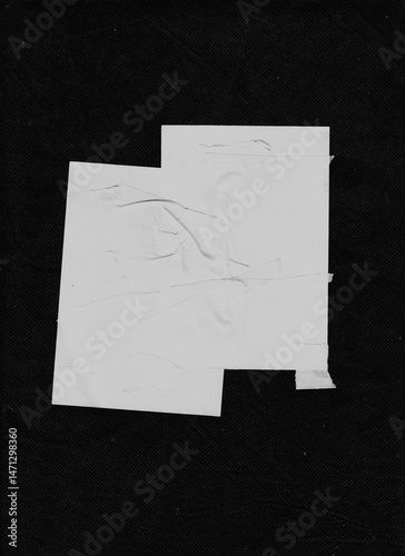 Scattered white paper strips forming dense diagonal and horizontal patterns over black fabric. Clean, modern, and dynamic layout for abstract visual design.