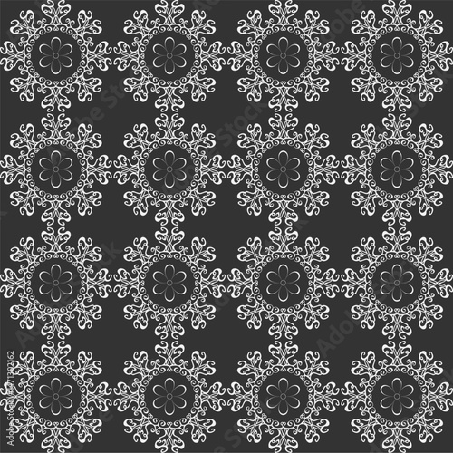 Beautiful lace seamless pattern on a gray background