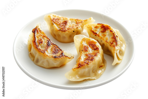 Golden pan-fried Japanese gyoza dumplings served on ceramic plate, isolated on white transparent background, concept of Asian cuisine
