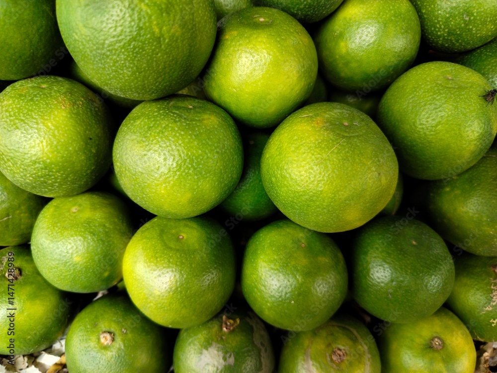 A pile of fresh sweet lime or sweet lemon. A pile of fresh sweet lime or sweet lemon.