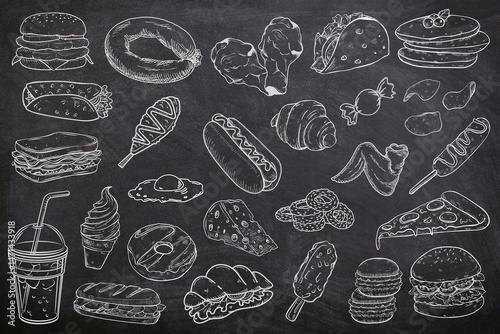 Various of fast food seamless set on black background. Sketch of junk food on chalk board. Line art of food and drink on black board