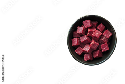 Cubes of meat in a bowl photo
