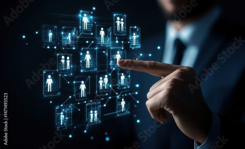 A businessman interacts with a digital network of interconnected human icons, representing global connectivity and teamwork in a modern business setting. : Generative AI