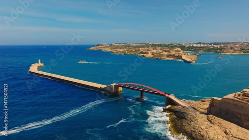 Drone view of Grand harbour of Valletta, bridge and lighthouse. Malta