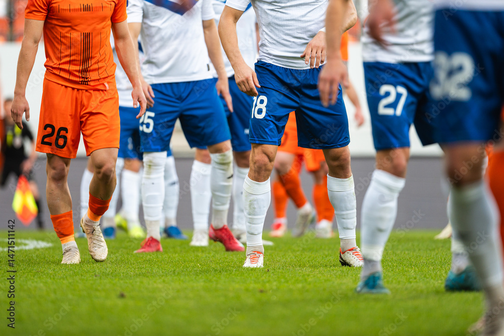 Football player's legs during set piece