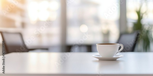 Wallpaper Mural A single cup of coffee sits on a white table in a bright, modern office setting, with blurred background of chairs and windows. : Generative AI Torontodigital.ca