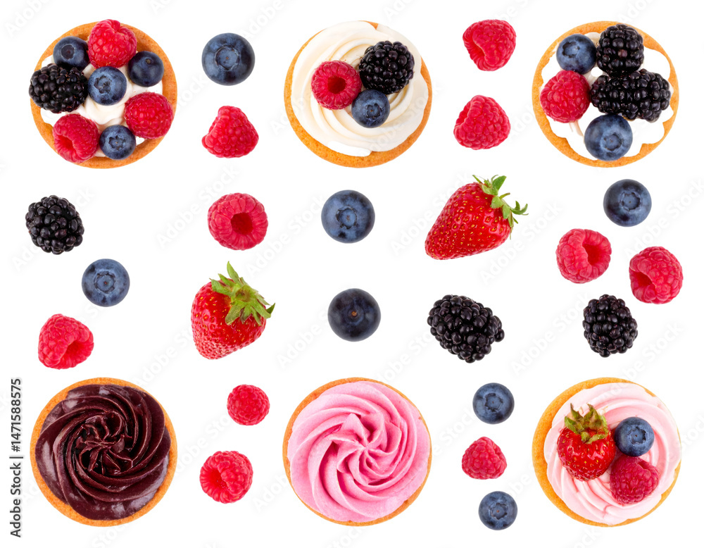 Set of delicious mini cakes with fresh berries on transparent background
