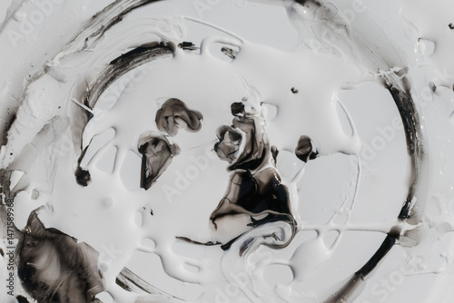 Streaks and drops of thick white paint
