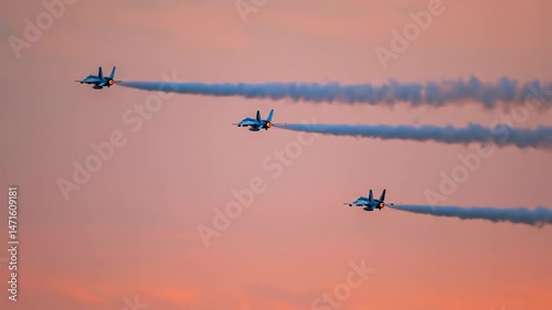 Jet aircraft flyover sunset display