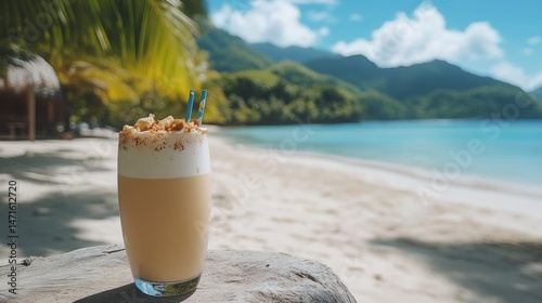Refreshing tropical drink on a beachside rock.