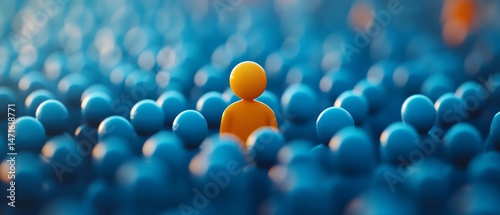 A person is standing out in a crowd of blue spheres