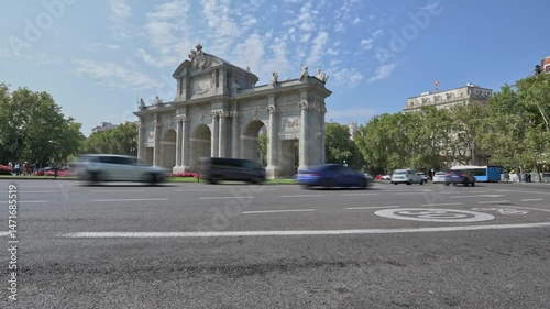 Madrid, Puerta de Alcala, timelapse video on a sunny spring day