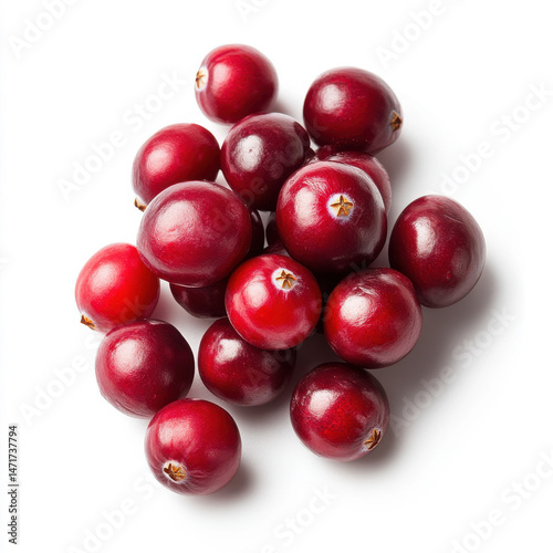 A handful of fresh cranberries with their bright red color, isolated on a white background
