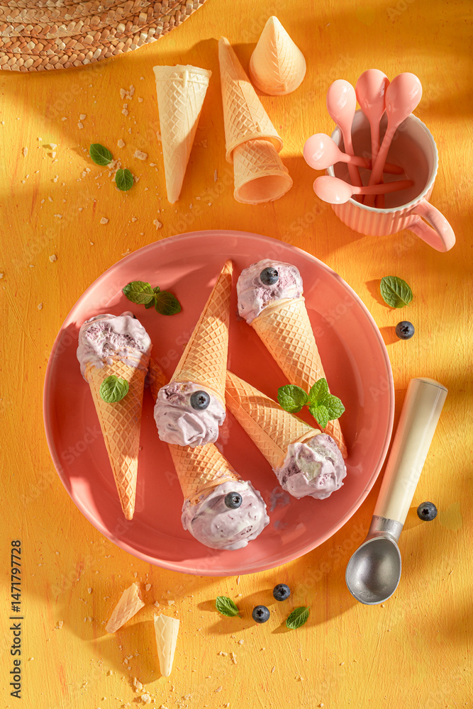 Cold and sweet blueberry ice cream as a summer dessert.
