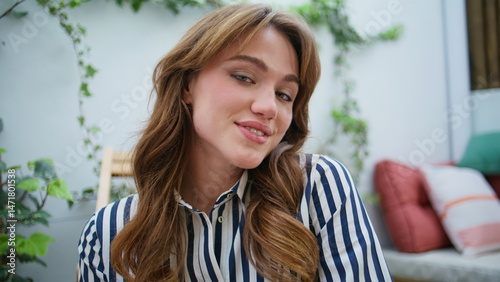 Obraz na płótnie Portrait cheerful woman smiling sitting outdoors balcony. Beautiful lady relaxed w salonie