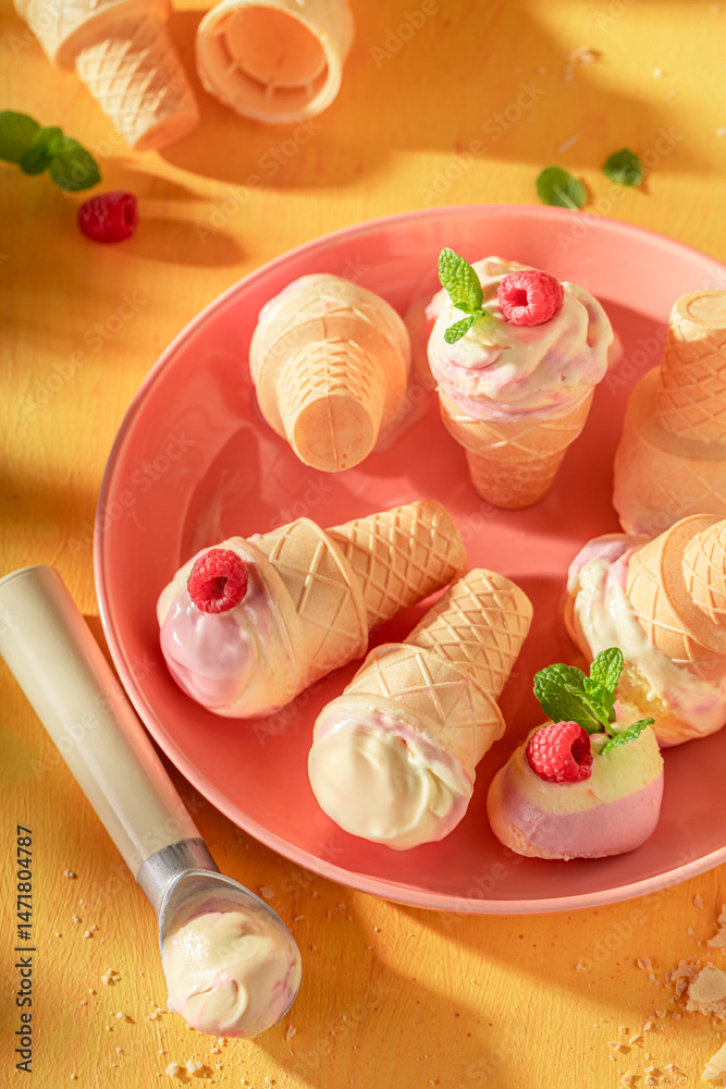 Sweet and delicious raspberry ice cream as a summer dessert.