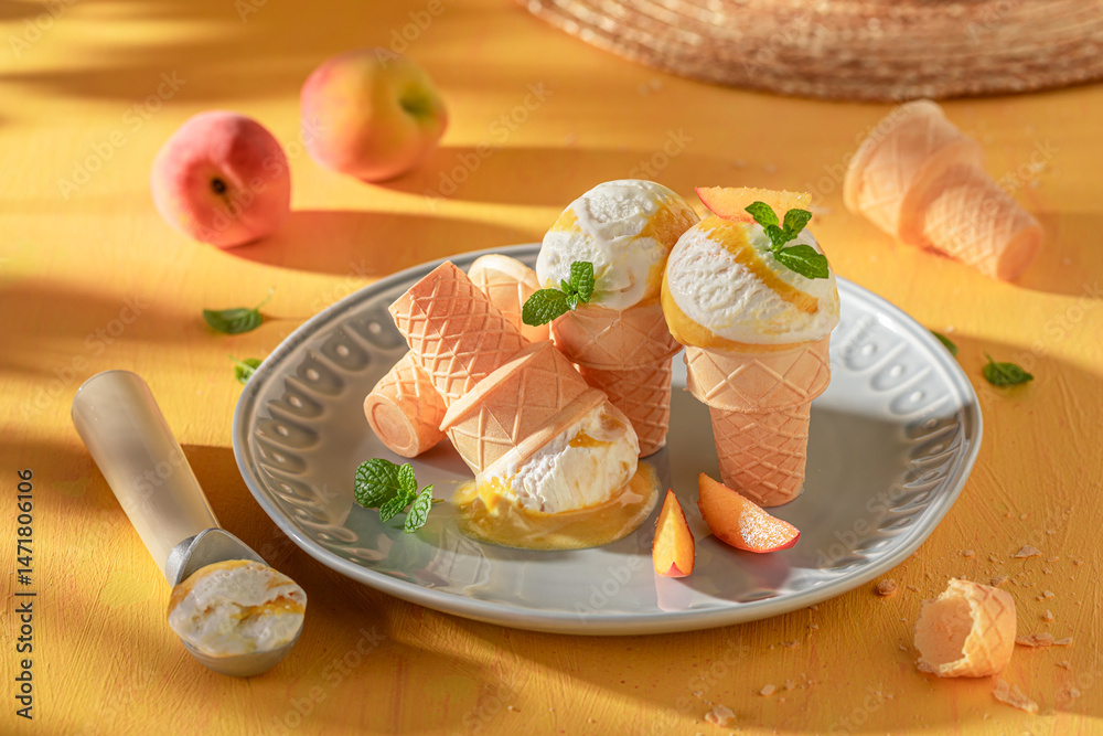 Fresh and delicious peach ice cream as a creamy dessert.