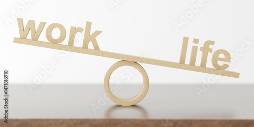 Wooden seesaw or scale with the words work and life, the life part being down, on white background, work-life-balance concept, selective focus
