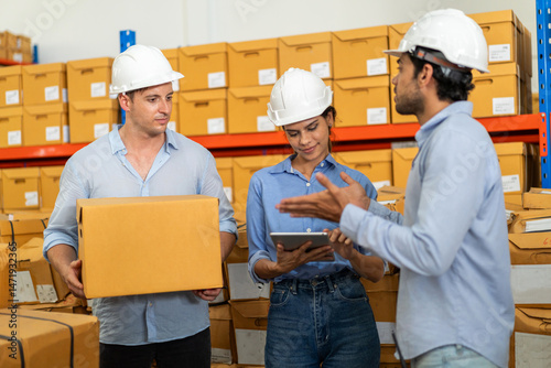 Wallpaper Mural Team of logistics staff discussing parcel storage in crowded warehouse, shipping on smart logistics, inventory management and supply chain tech, supporting e-commerce, import and export operations Torontodigital.ca
