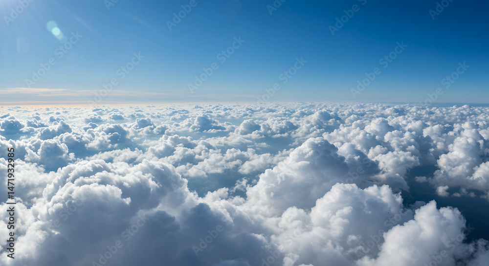 Fototapeta premium Sky High: Stunning Cloudscape Under a Brilliant Blue Sky - Aerial View Beauty!