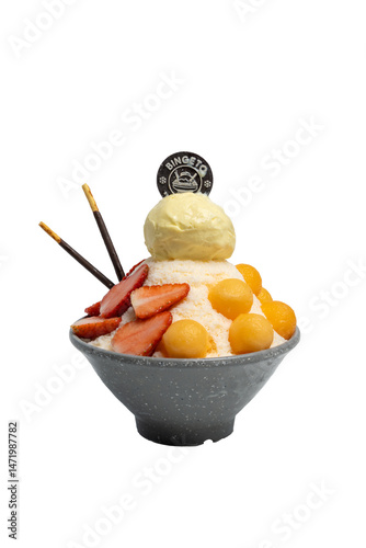 A colorful bingsu dessert with a scoop of ice cream, topped with fruit and other sweet toppings, and served in a bowl.