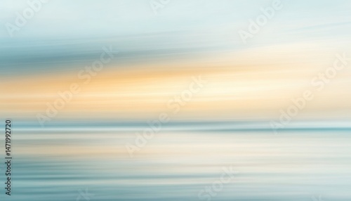 Golden Light on Tranquil Ocean Horizon Underneath Pale Blue Sky Nature Scene