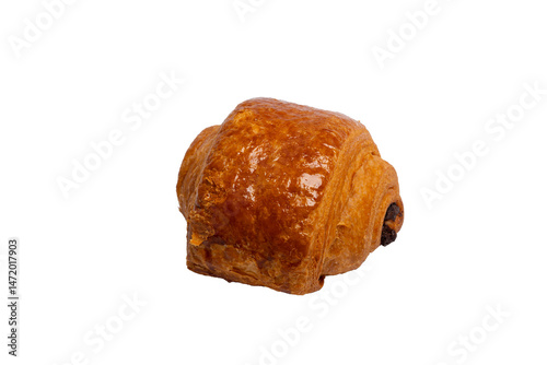 A glossy, golden-brown pain au chocolat, filled with dark chocolate, is isolated against a stark white background.