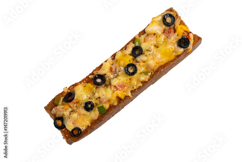 A rectangular pizza baguette with melted cheese, olives, peppers, and herbs is isolated on a white background.