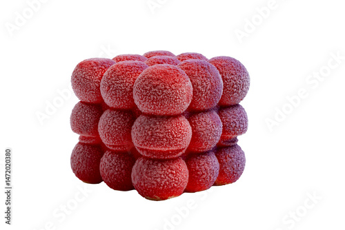 A vibrant red, edible cake, uniquely formed from frosted spherical components, creating a textured, delectable cube-like dessert.