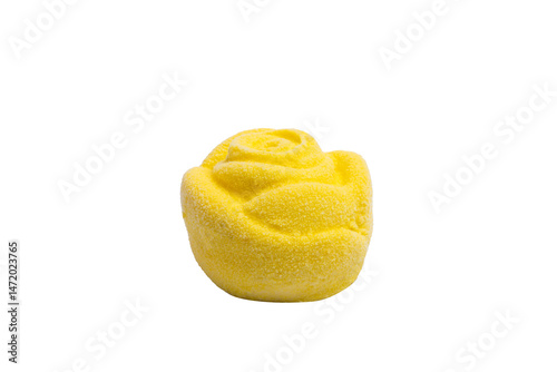 A charming yellow edible cake, shaped like a frosted rose, presenting a delightful and intricately textured sweet treat.