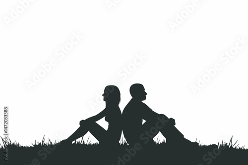 Silhouette of man and woman sitting back to back in grass together