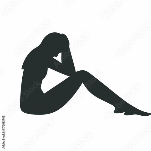 Silhouette of depressed woman sitting with head in hands expressing grief
