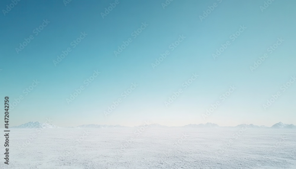 Fototapeta premium Vast Snowy Landscape under Pale Blue Sky in Winter with Icy Field and Open Horizon for Peaceful Cold Natural Scenery on Bright Frosty Day