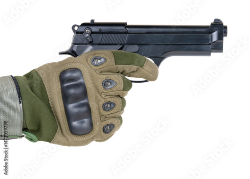 9mm pistol in hand wearing tactical glove on white background
