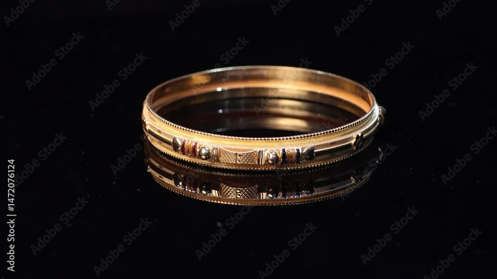 4k.Traditional Indian design gold bangle. Fancy designer antique golden Bangles also known as 