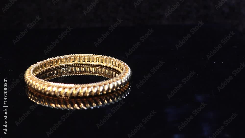 4k.Traditional Indian design gold bangle. Fancy designer antique golden Bangles also known as 