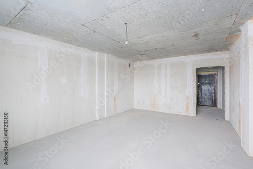 rough repairs for self-finishing. interior decoration, bare walls of the room, stage of construction. interior apartment room.