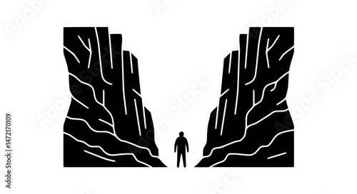 Man standing by cliff black and white 