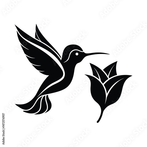 Elegant black and white silhouette of a hummingbird hovering near a flower ready to pollinate